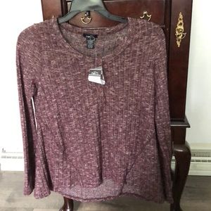 purple long sleeved shirt